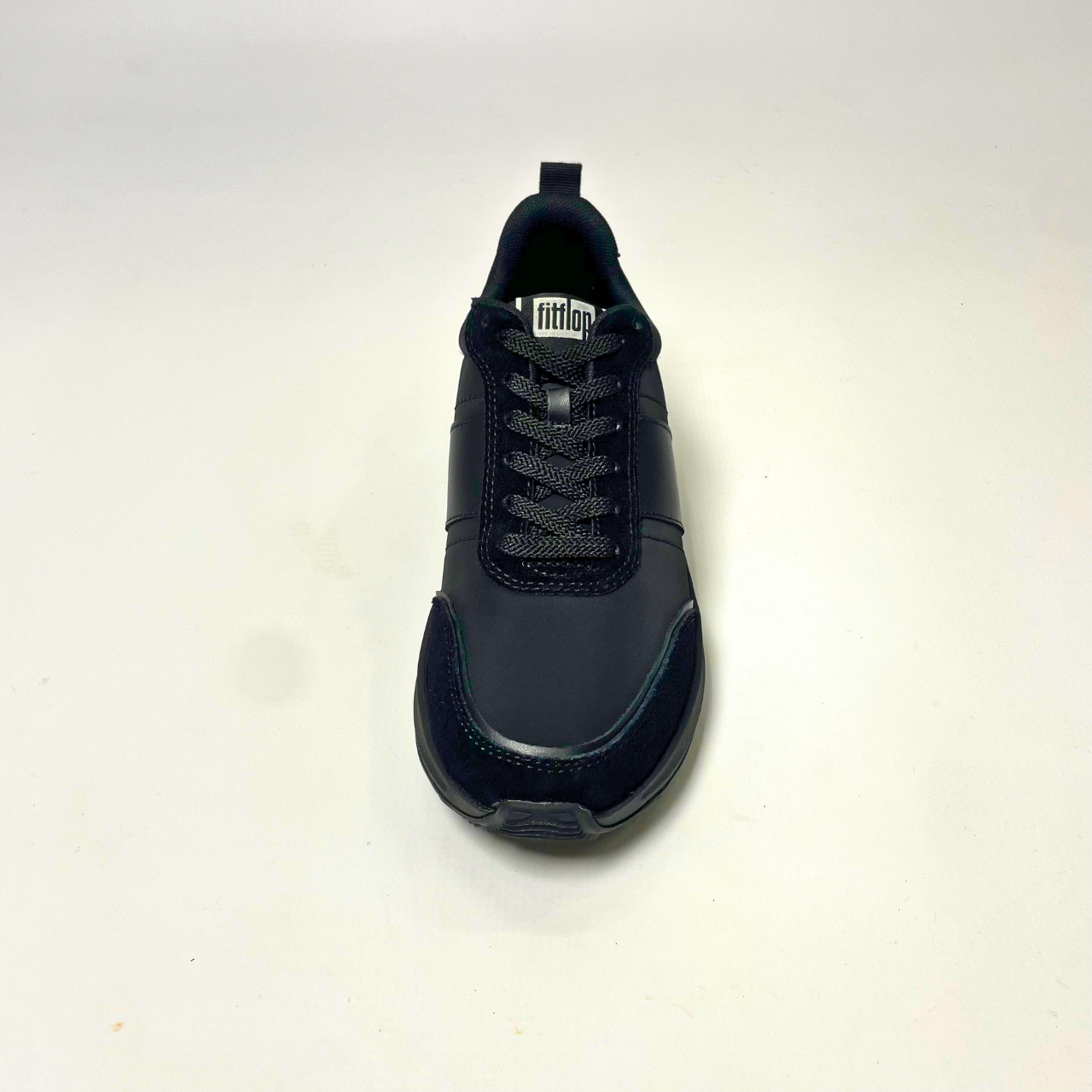 FitFlop F-Mode Flow Fabric Flatform black sneaker with cushioned Microwobbleboard midsole, arch support & recycled PET fabric upper. 4