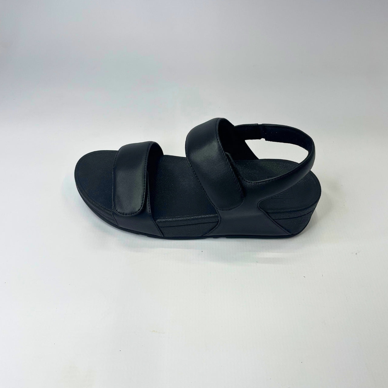 FitFlop Lulu Adjustable Leather Back-Strap black sandal with cushioned Microwobbleboard midsole, microfibre lining & slip-resistant outsole. 3