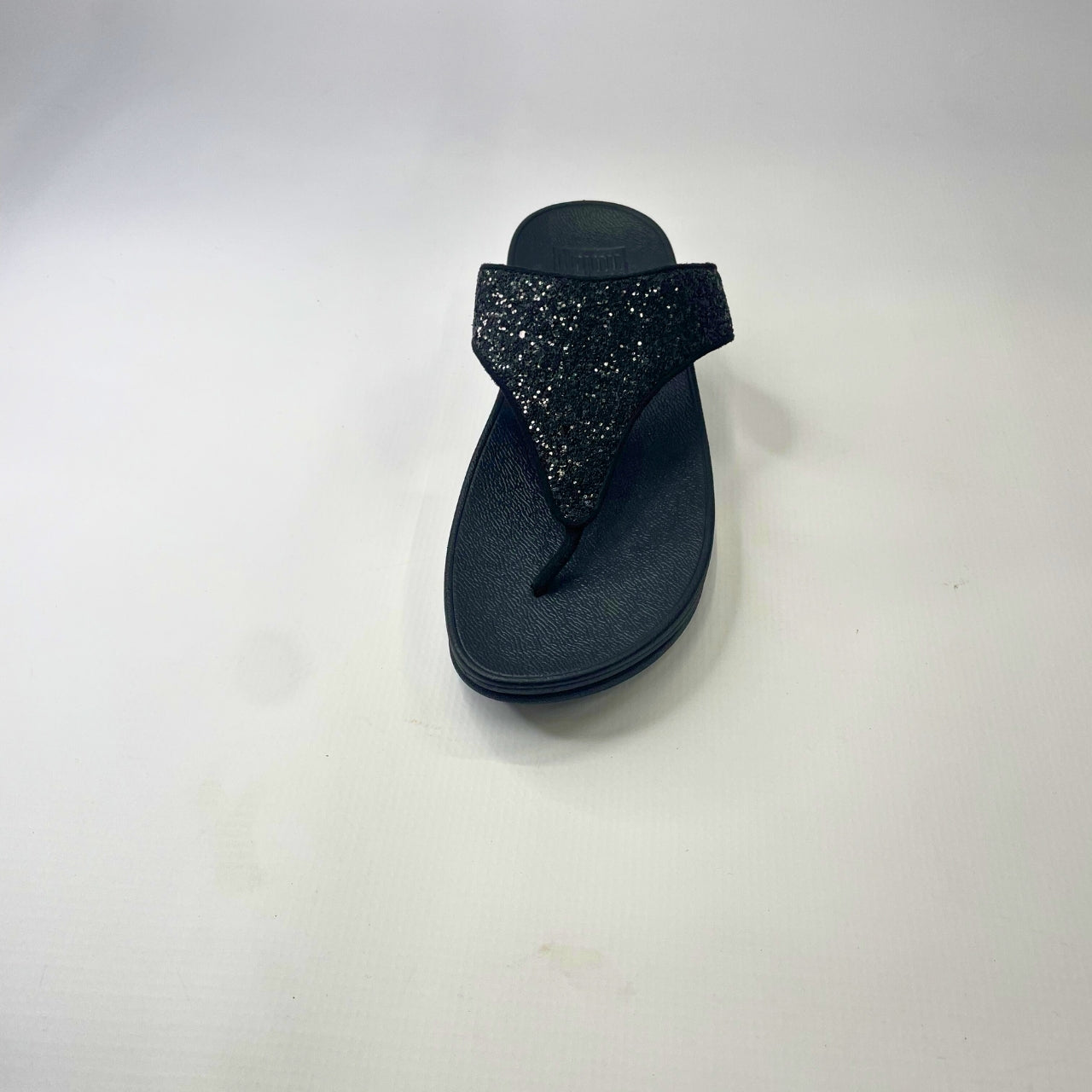 FitFlop Lulu Glitter Toe-Thong black sandal with glittery PU upper, cushioned arch support & slip-resistant rubber outsole. 4