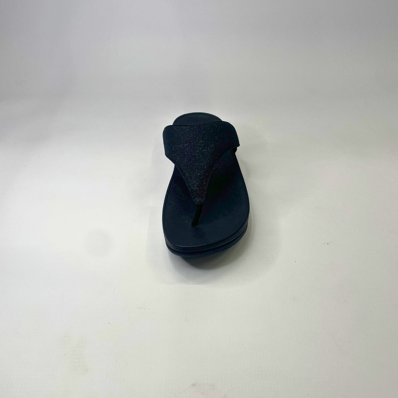 FitFlop Lulu Shimmerlux Toe-Post black sandal with glitz mesh upper, cushioned Microwobbleboard midsole & slip-resistant rubber outsole. 4