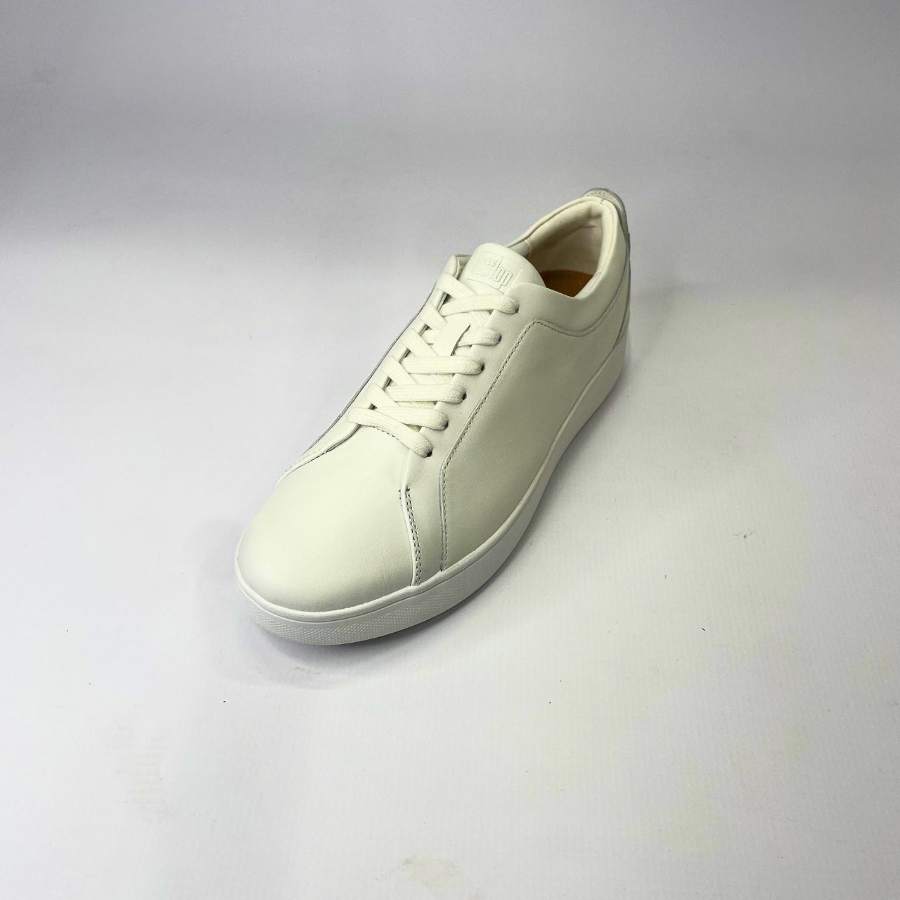 FitFlop Rally leather urban white sneaker with ultra-flexible cushioning, anatomically contoured footbed & slip-resistant rubber pods for maximum comfort. 2