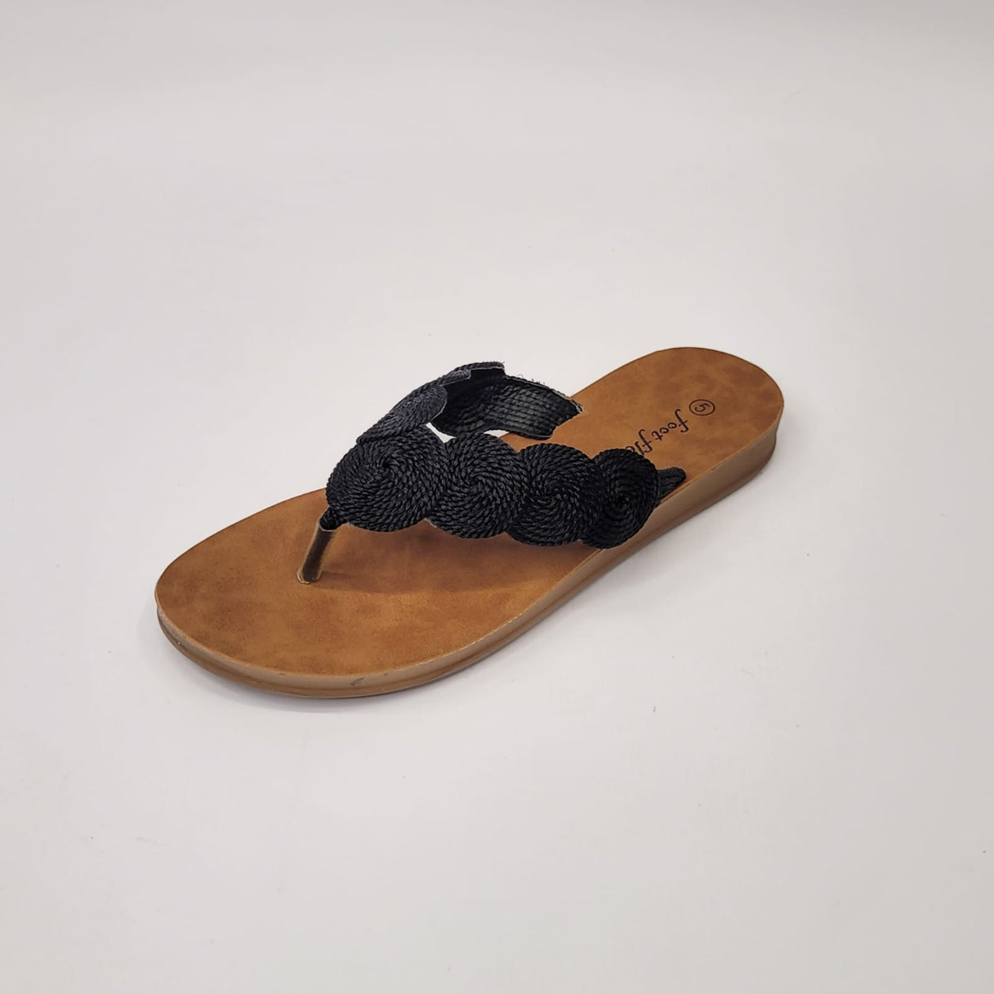 Foot Flex black string toe thong sandal with woven detail, cushioned footbed, and lightweight flexible sole. 2