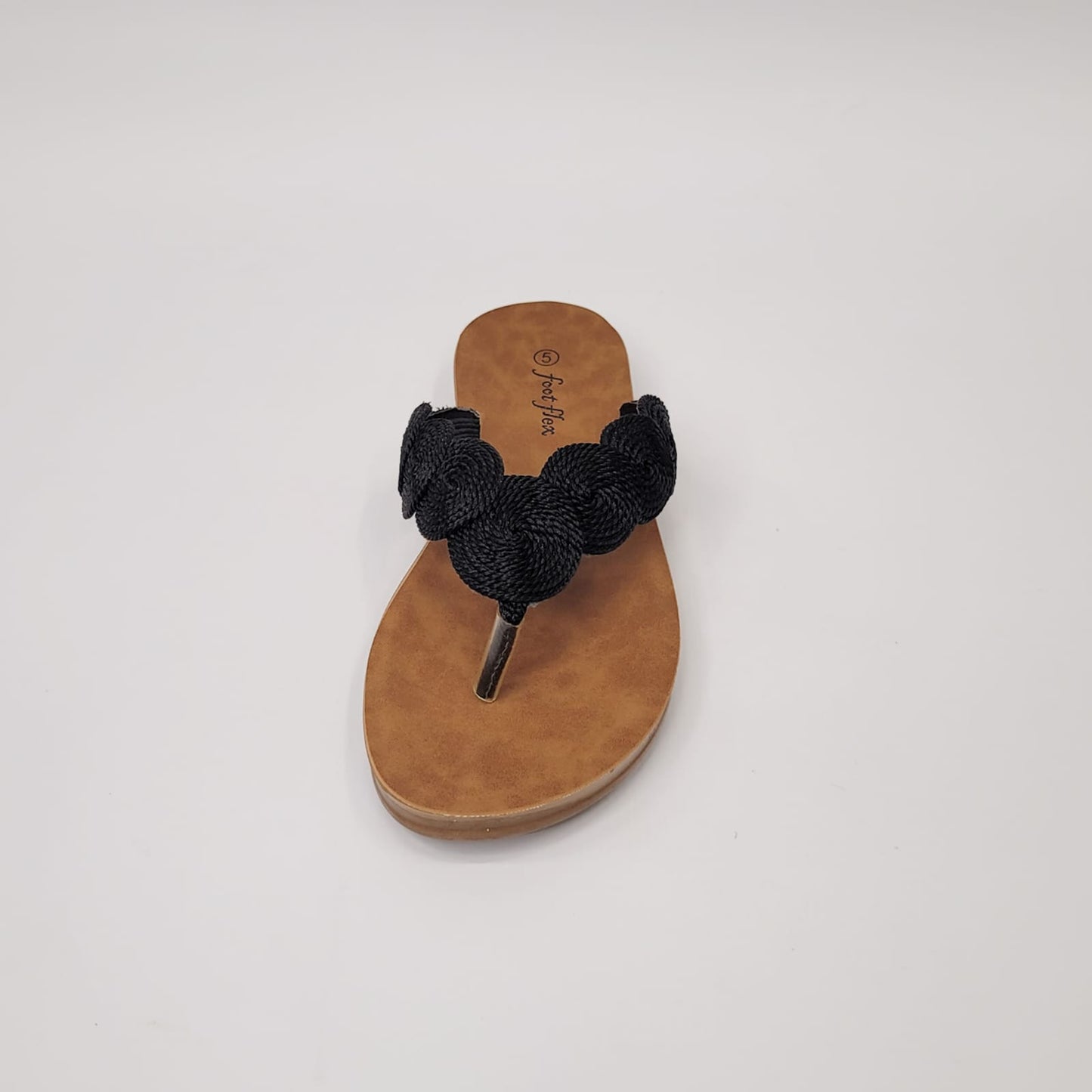 Foot Flex black string toe thong sandal with woven detail, cushioned footbed, and lightweight flexible sole. 4