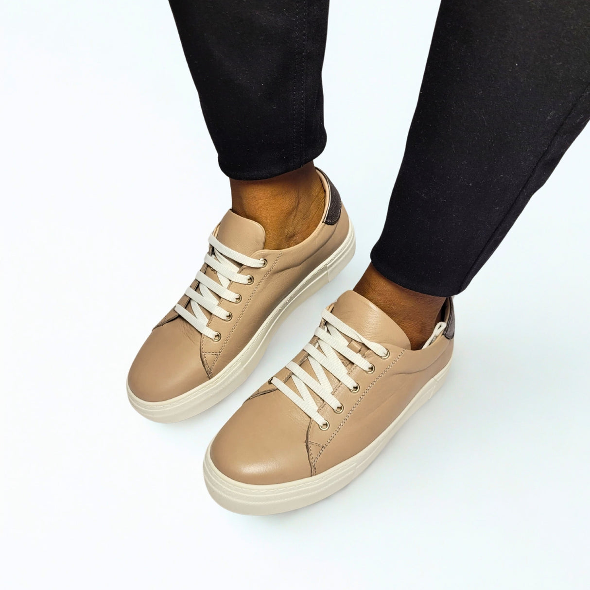 GIA brown leather platform sneaker with pewter heel accent and white sole. 1