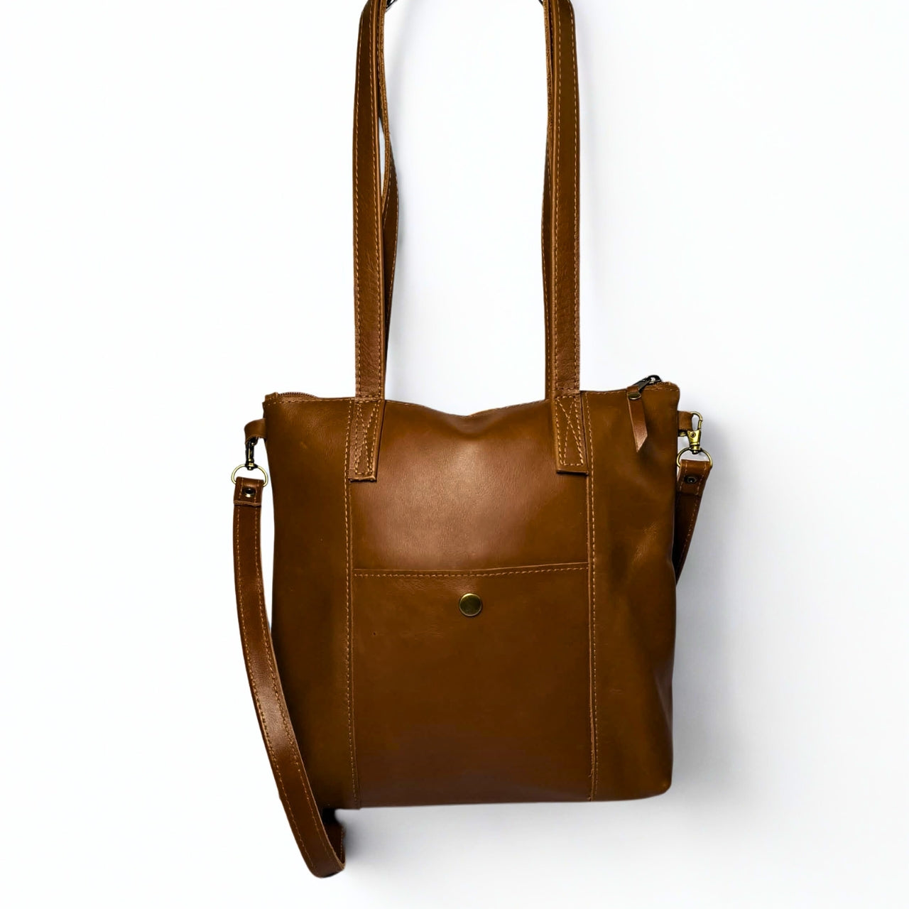 Gia Camera Bag in Texas Toffee leather – compact crossbody with zip closure, rear magnetic pocket, adjustable strap, and embossed GIA logo patch 2