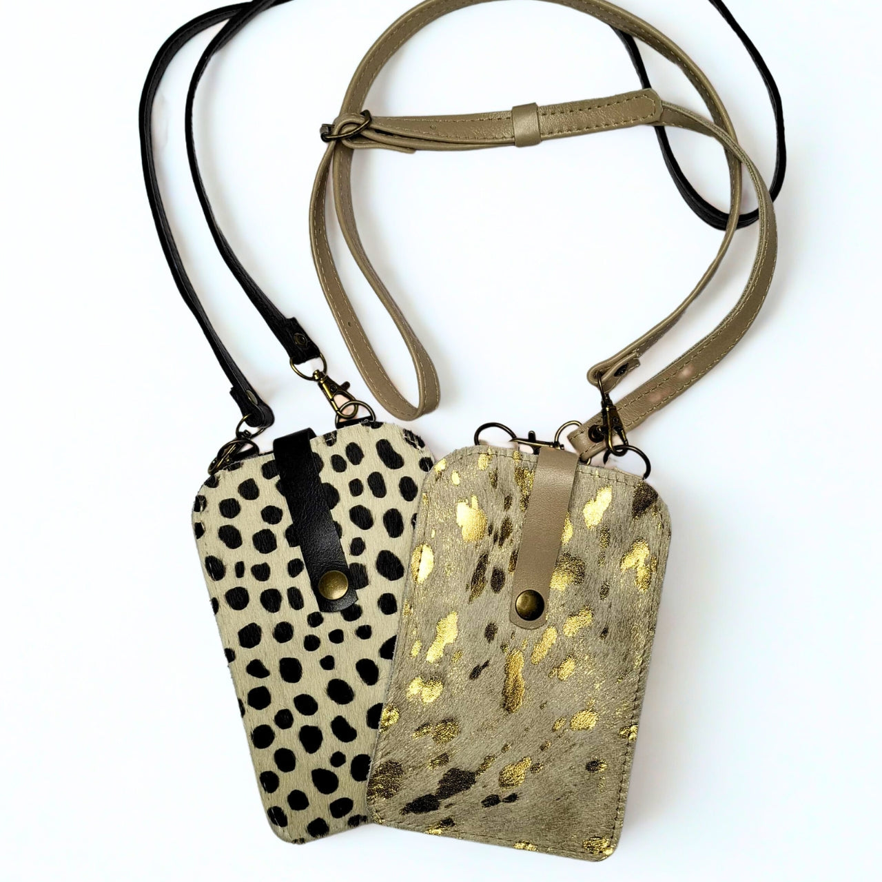 Gia Cell Bag in black and white cheetah print – hair-on-hide leather, compact hands-free design with gold hardware and detachable strap, fits most smartphones. 3