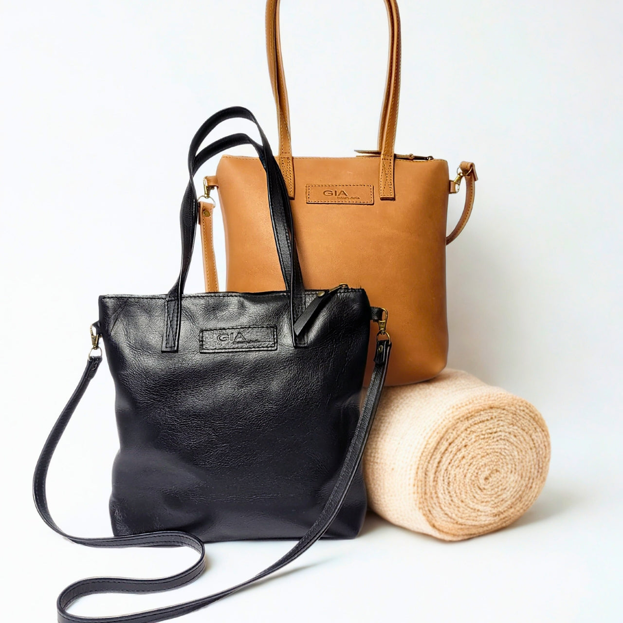 Gia toffee leather dual tote with zip closure, shoulder straps, and crossbody option. 3