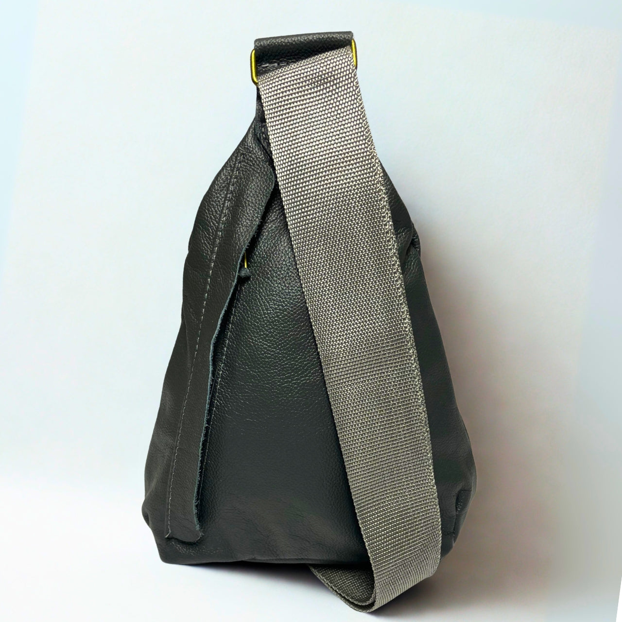 Gia grey triangle backpack in metallic leather with gold buckle, front and rear zip pockets.
