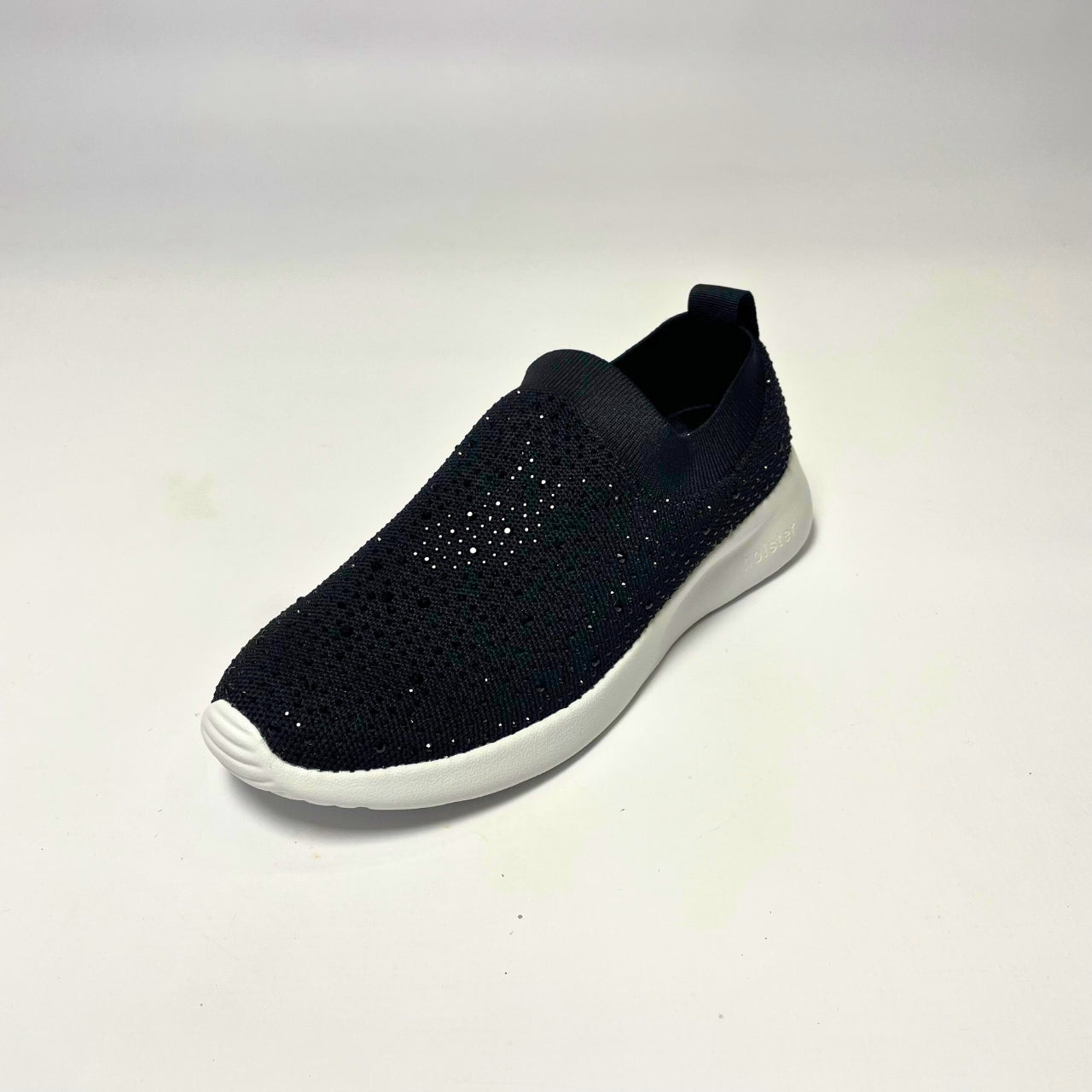 Holster Fireflyer Black Sneaker β Vegan-friendly, cruelty-free slip-on sneaker with 3,100 hot-fixed jewels per pair. Made from recycled ocean plastics, certified by the Global Recycled Standard. Features a lightweight EVA foam outsole, soft padded PU foam insoles, and podiatry-approved comfort. Anti-mould, antibacterial, and non-slip for all-day wear. 2