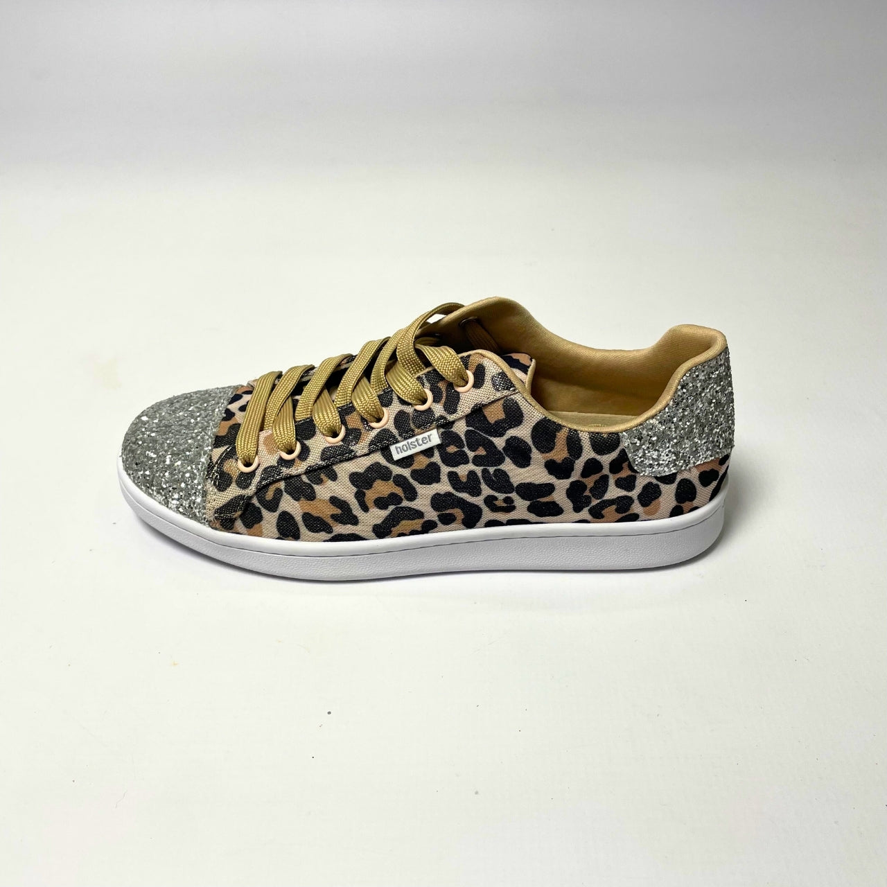 Holster Stardust Leopard Sneaker – Vegan-friendly, PETA-approved sneaker featuring a glitter toe and heel cap. Designed with a soft padded PU upper, cushioned PU foam insole, and non-slip rubber outsole for comfort and durability. Lightweight, antibacterial, and flexible. Adjustable polyester shoelaces for a secure fit. 3