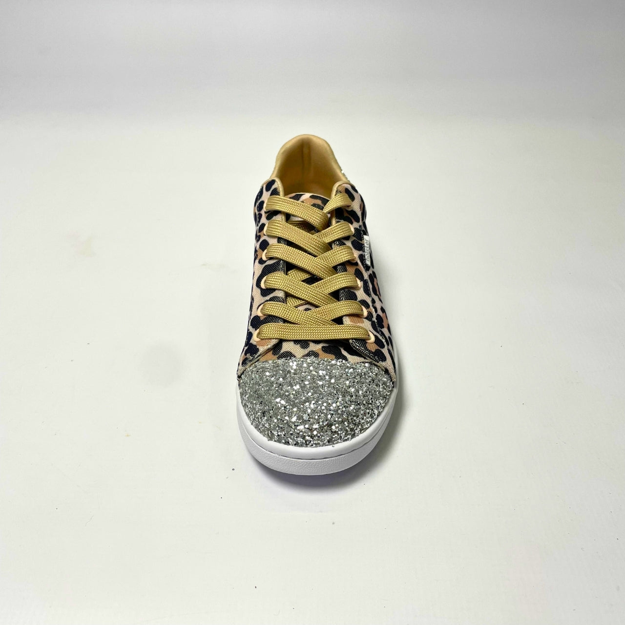 Holster Stardust Leopard Sneaker – Vegan-friendly, PETA-approved sneaker featuring a glitter toe and heel cap. Designed with a soft padded PU upper, cushioned PU foam insole, and non-slip rubber outsole for comfort and durability. Lightweight, antibacterial, and flexible. Adjustable polyester shoelaces for a secure fit. 4