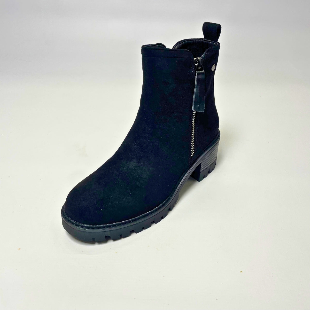 Jumbo Black Block Heel Ankle Boot – Soft suede upper in taupe, featuring a stacked block heel for height and stability. Rounded toe for a timeless look and inner side zipper for easy wear. Perfect for casual outings, chic fall style, and versatile wardrobe pairings. 2