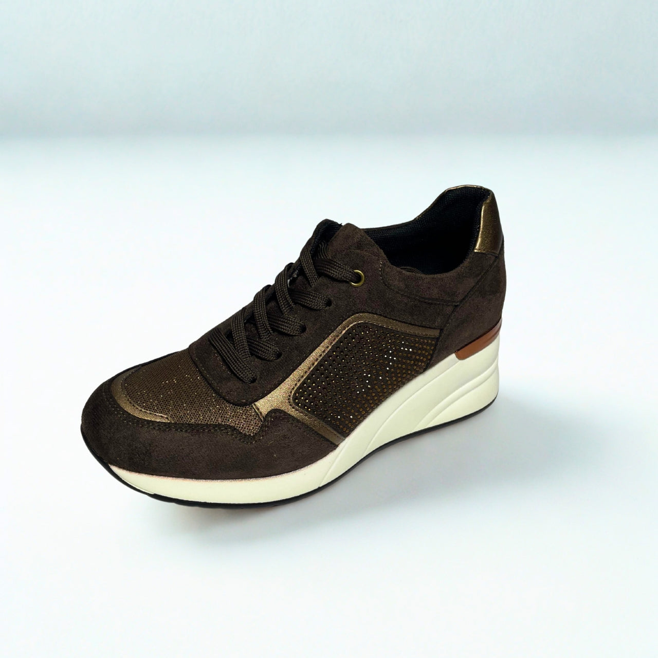 Jumbo brown lace-up wedge sneaker with diamante and bronze accents, hidden heel and white sole.