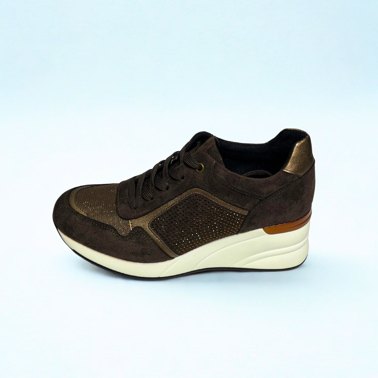 Jumbo brown lace-up wedge sneaker with diamante and bronze accents, hidden heel and white sole.