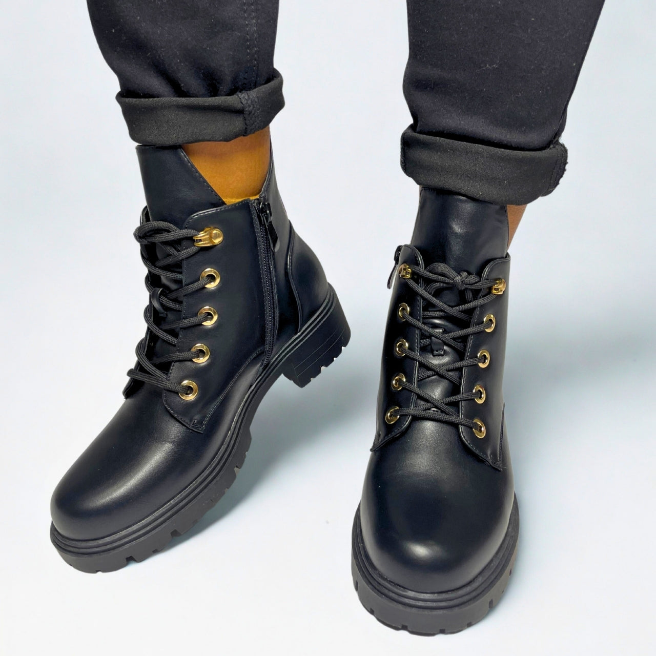 Plum Chunky Lace Up black faux leather boot with chunky sole, block heel, gold-tone eyelets, side zip, cushioned ankle collar, and treaded outsole 1