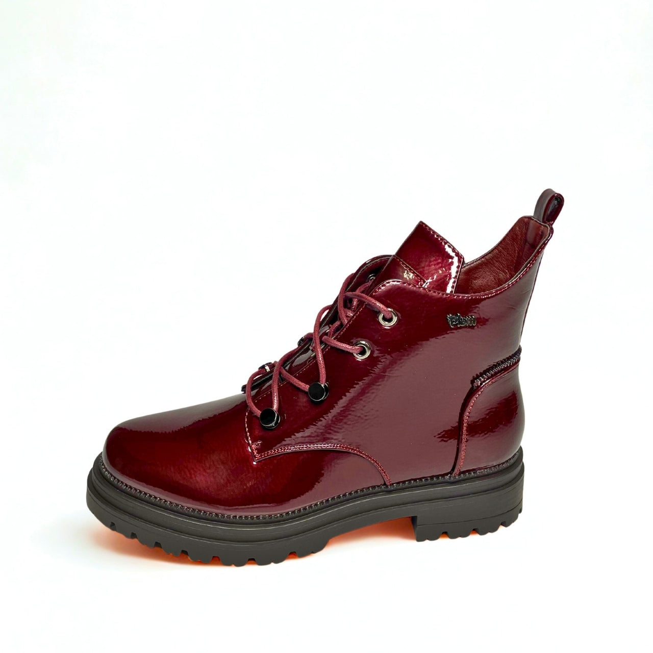 Burgundy faux leather chunky lace-up boots with gold eyelets, side zip, and thick treaded sole for bold street style.