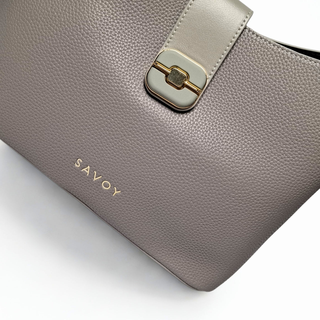 Savoy U-Shaped Handbag in grey – structured pebbled leather bag with gold-tone push-lock flap, adjustable strap, and minimalist SAVOY branding 4