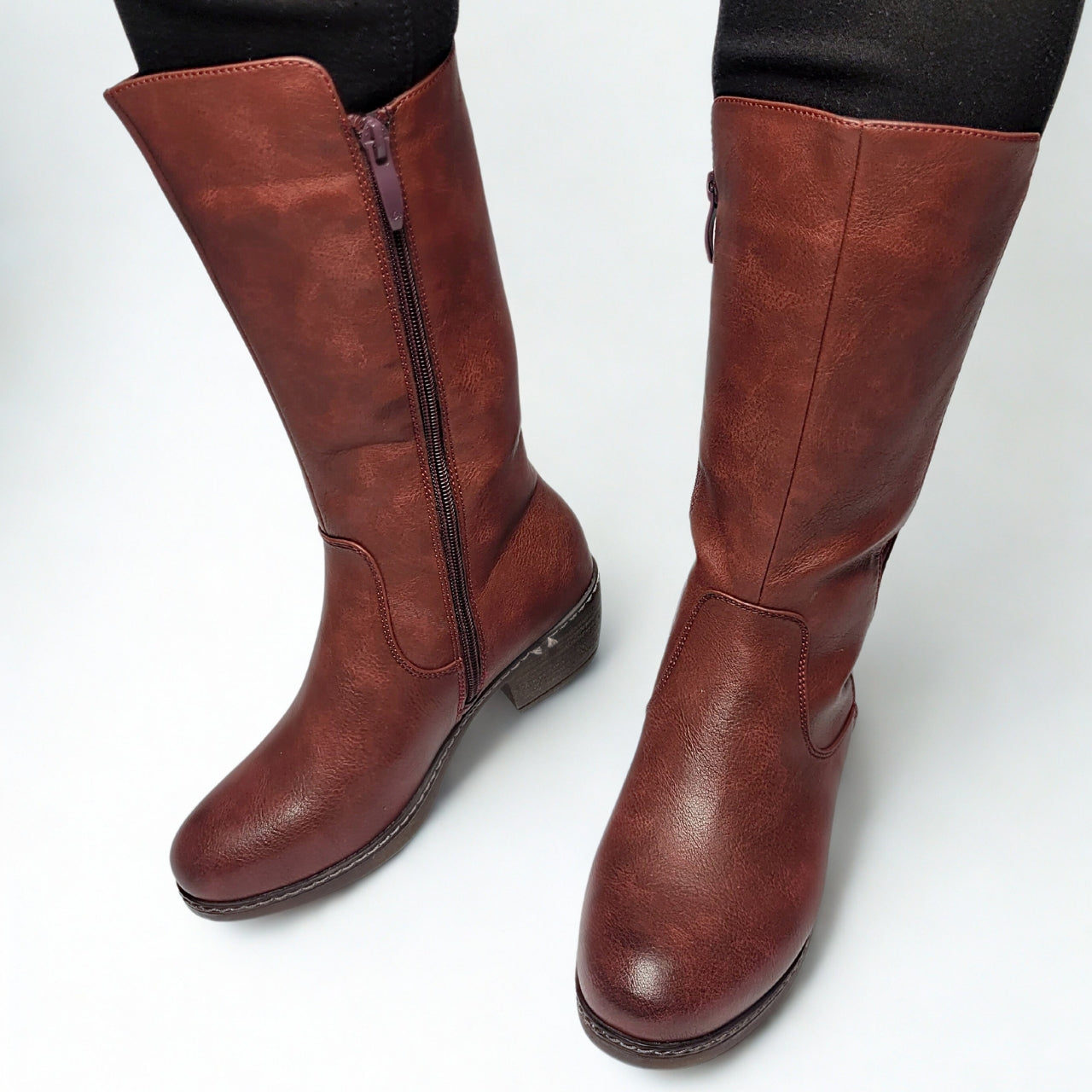 Savoy knee-high red faux leather boot with block heel and side zip closure. 1