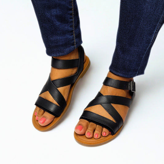 TOMS Sloane black sandal – sleek leather and suede upper, ankle strap with buckle, eco-conscious OrthoLite® insole, and cushioned TPR sole for everyday style 1