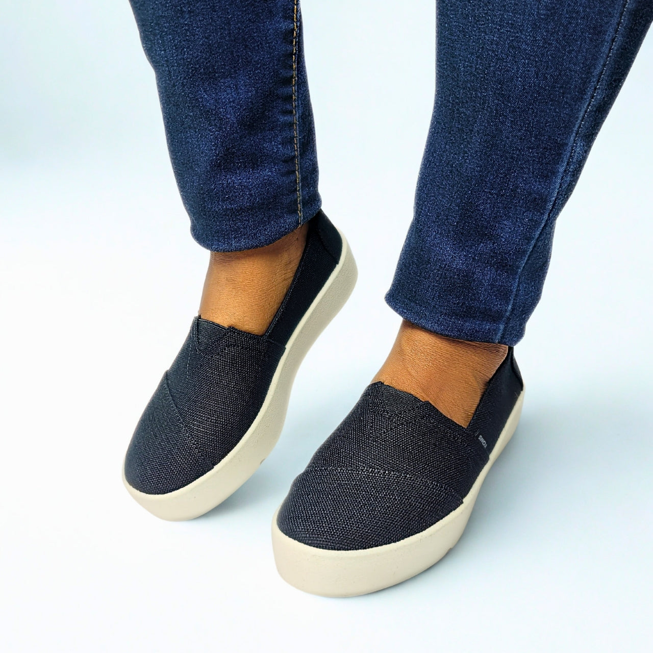 TOMS Verona black slip-on sneaker with jute-based Heritage Canvas upper, 1.5-inch T-Flex sole for flexibility, PU insole, and padded heel for comfort 1