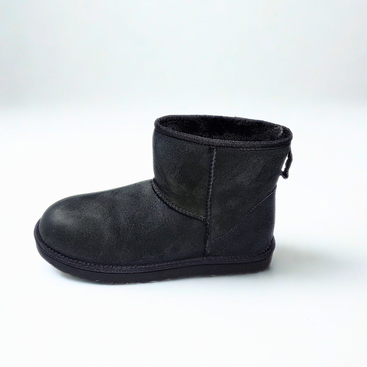 UGG men's Classic Mini black boot with twinface sheepskin and Treadlite outsole. 3