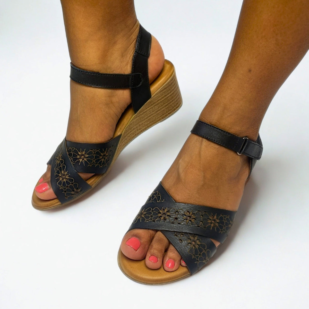 Gia Black Laser Cut Leather Wedge on foot