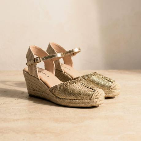 Gold women’s wedge sandals from Queue Shoes wedge collection