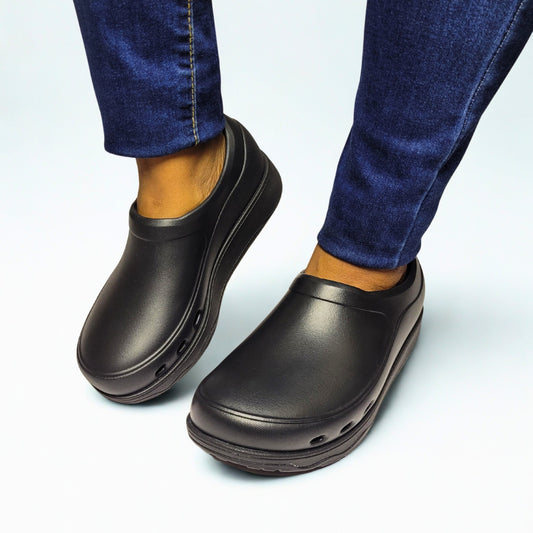  FitFlop black EVA clogs with slip-resistant sole and wide-fit Microwobbleboard cushioning. 1