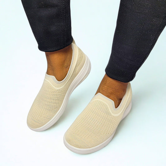 FitFlop beige knit slip-on sneaker with iQushion cushioning and contoured footbed.