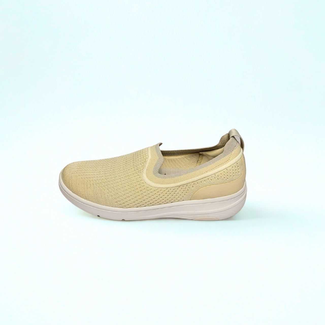 FitFlop beige knit slip-on sneaker with iQushion cushioning and contoured footbed.