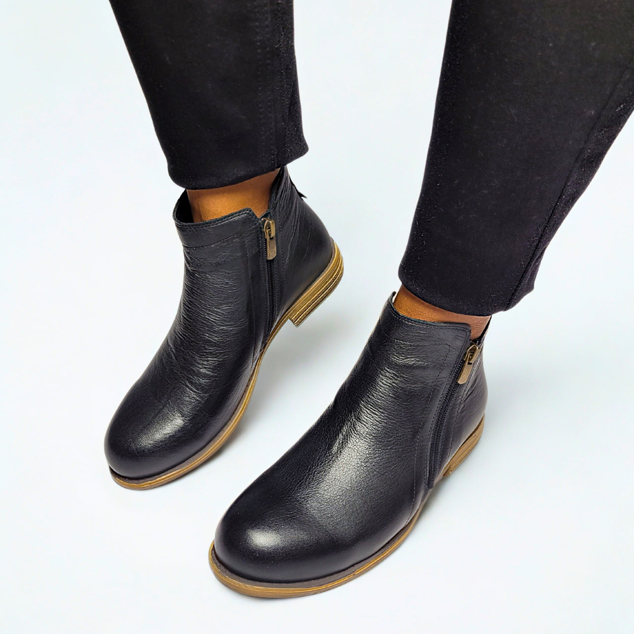  GIA black leather ankle boot with dual side zips and low stacked heel. 1