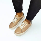  GIA brown leather platform sneaker with pewter heel accent and white sole. 1