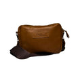 Gia Camera Bag in Texas Toffee leather – compact crossbody with zip closure, rear magnetic pocket, adjustable strap, and embossed GIA logo patch 1