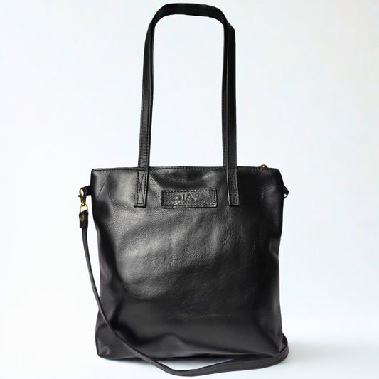 Gia black leather dual tote with zip closure, shoulder straps, and crossbody option. 1