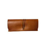 Gia toffee leather sunglass case with snap closure and soft lining for scratch protection. 2