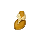Gia beige leather knot sandals with cushioned insole, slip-on design, and knotted strap detail – chic women’s summer footwear for casual wear, holidays, and resort style.