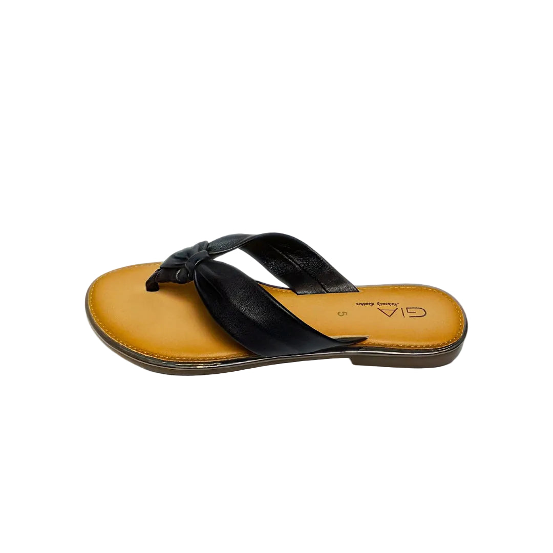 Gia black leather knot sandals with cushioned insole, slip-on design, and knotted strap detail – chic women’s summer footwear for casual wear, holidays, and resort style.