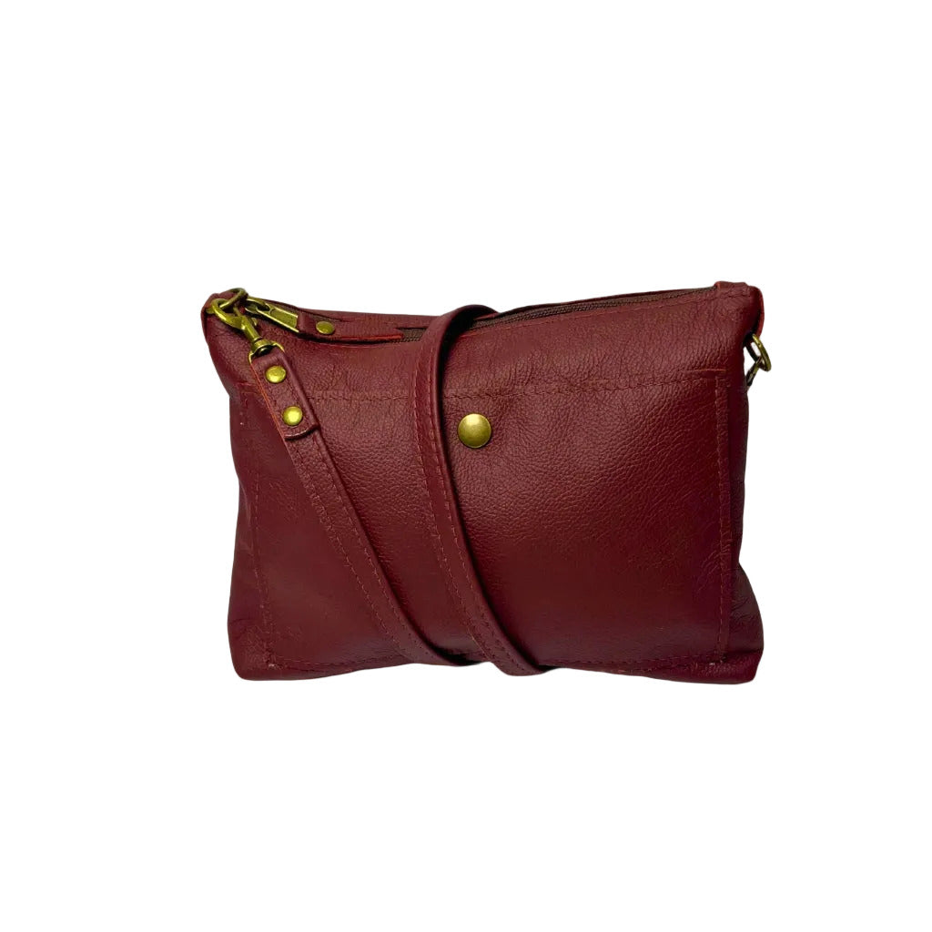 Gia dark red crossbody bag in genuine leather with adjustable strap, antique brass hardware, and embossed logo – compact designer handbag for everyday wear and evening outings.
