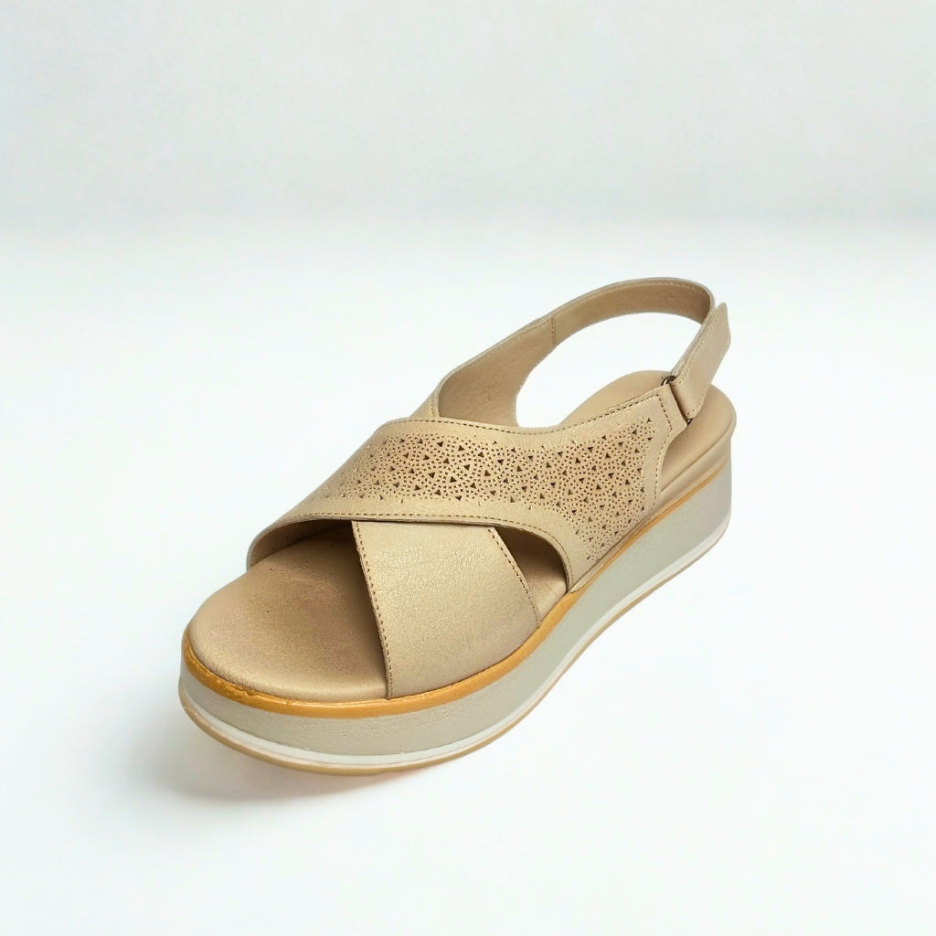 Gia grey silver leather platform sandals with laser-cut cross-over straps, cushioned insole, slingback strap, and slip-resistant sole – stylish women’s summer sandals with added height.
