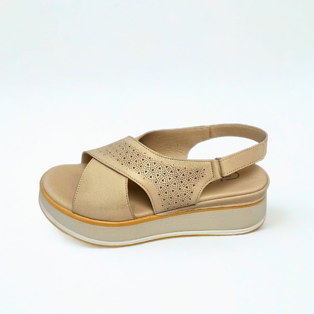 Gia grey silver leather platform sandals with laser-cut cross-over straps, cushioned insole, slingback strap, and slip-resistant sole – stylish women’s summer sandals with added height.
