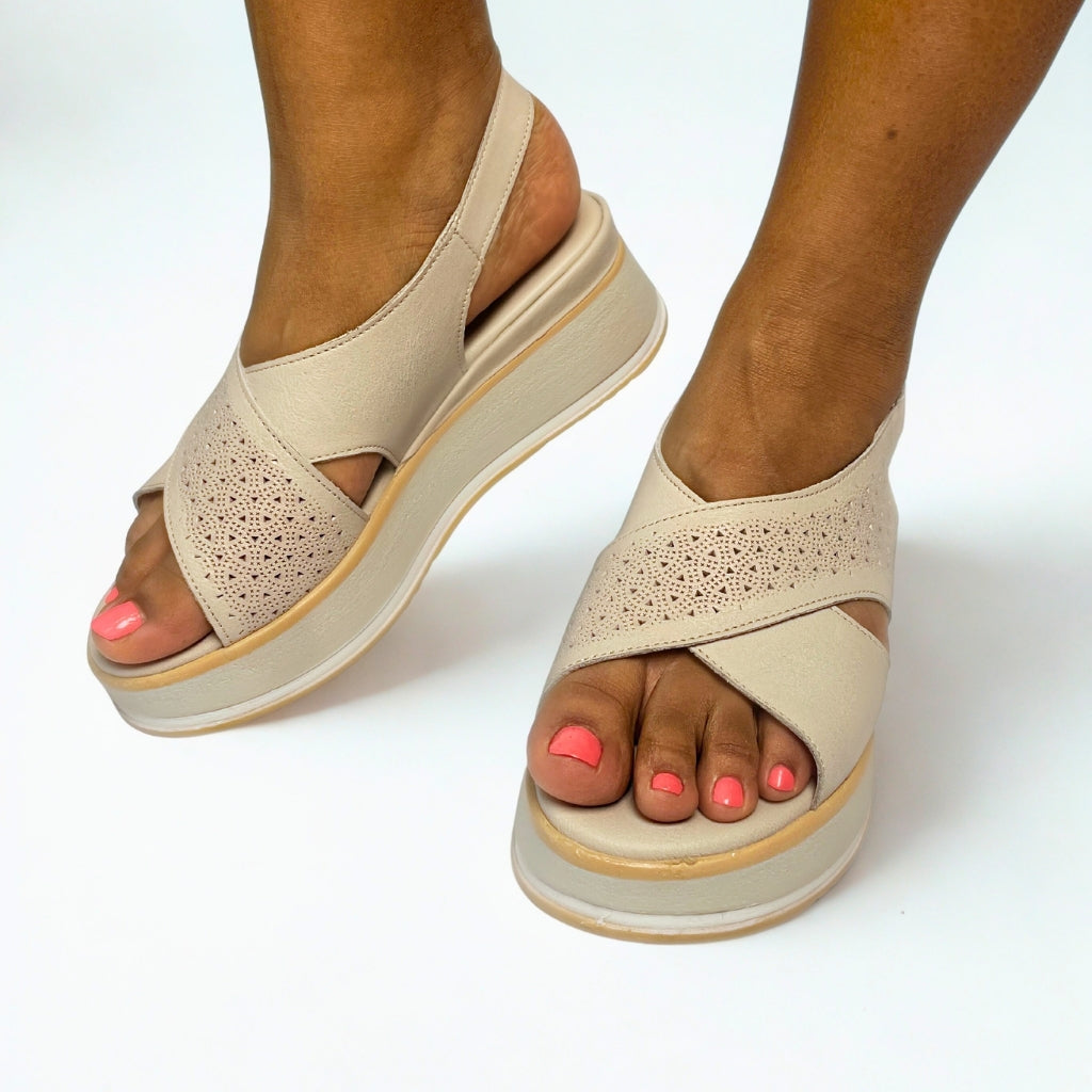 Gia grey silver leather platform sandals with laser-cut cross-over straps, cushioned insole, slingback strap, and slip-resistant sole – stylish women’s summer sandals with added height.
 