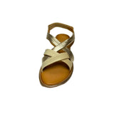 Gia off-white and gold leather criss cross slingback sandals with cushioned insole, adjustable strap, and flexible sole – elegant women’s summer footwear for comfort and style.