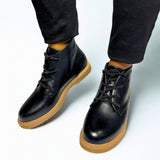 Plum Lace Up Ankle black faux leather boot with round toe, tonal lace-up front, cushioned collar, ankle support, and durable low-profile sole 1