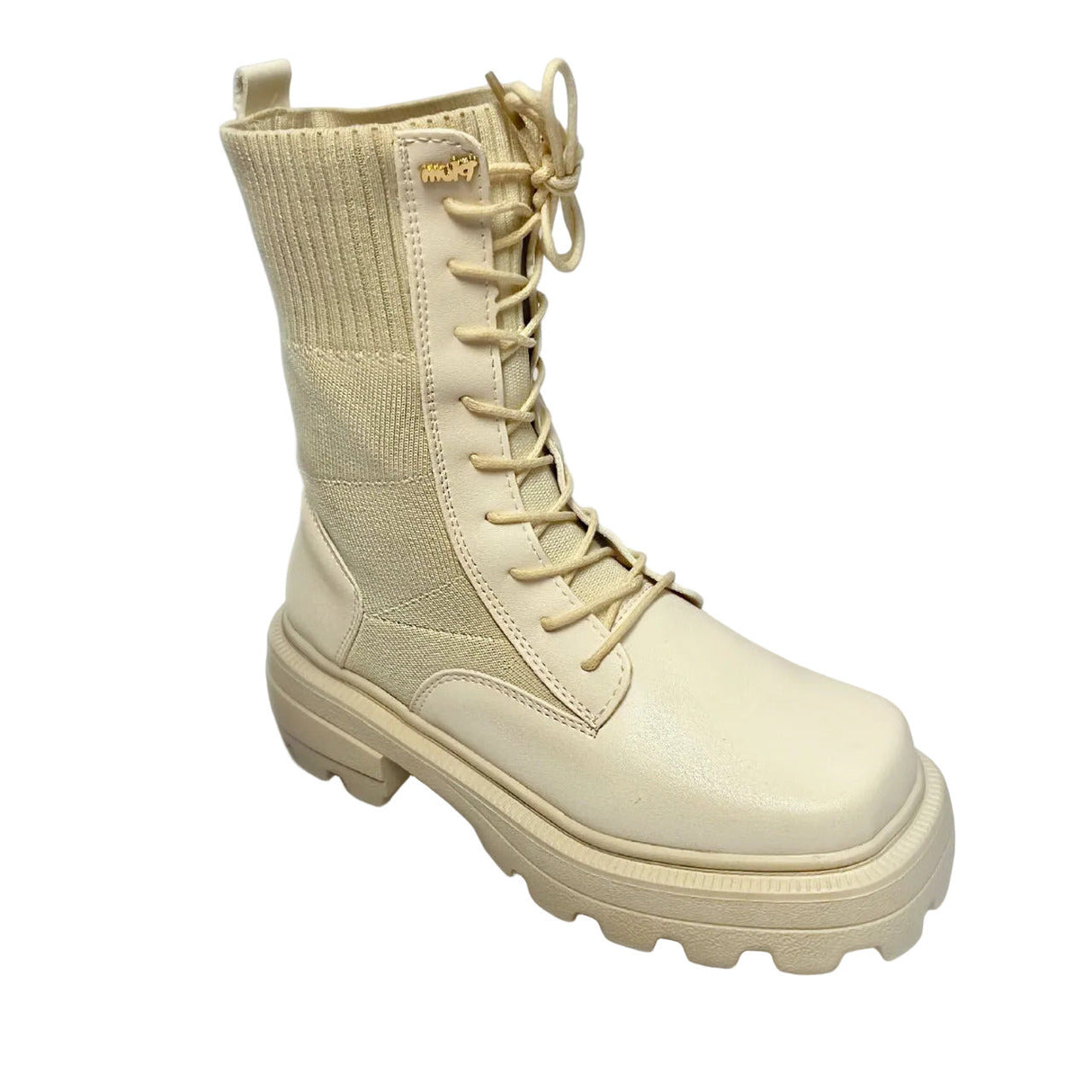 Plum beige combat-style boot with ribbed knit shaft, chunky lug sole, and lace-up front.