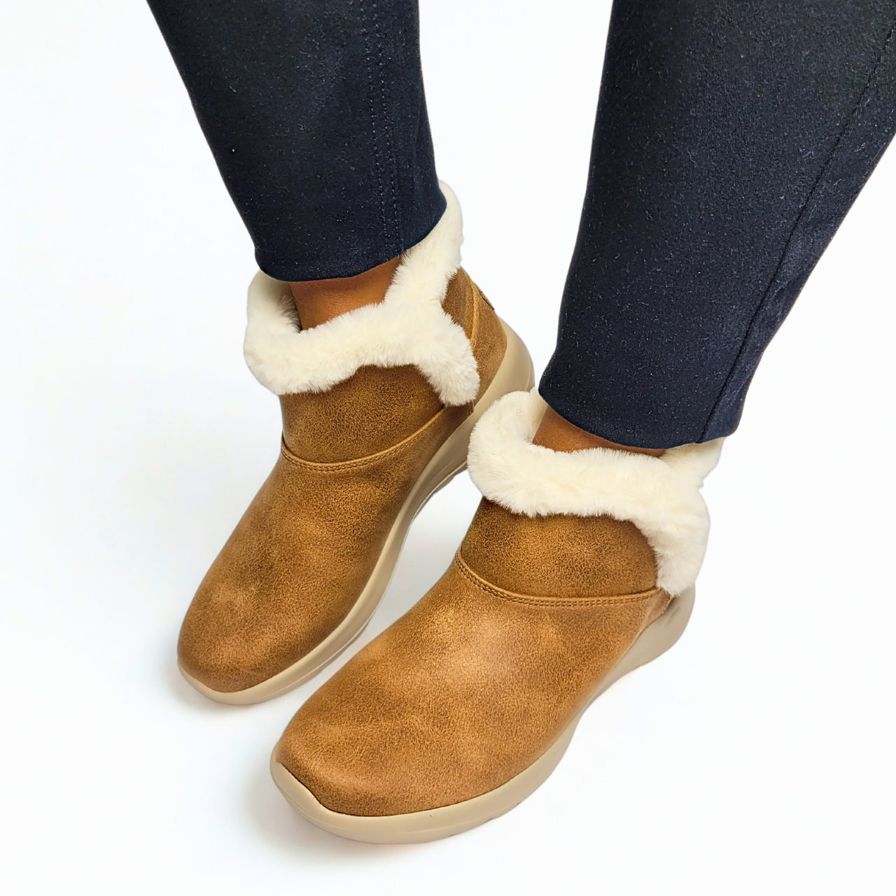  Skechers chestnut pull-on boot with faux fur collar and 5GEN cushioning sole. 1