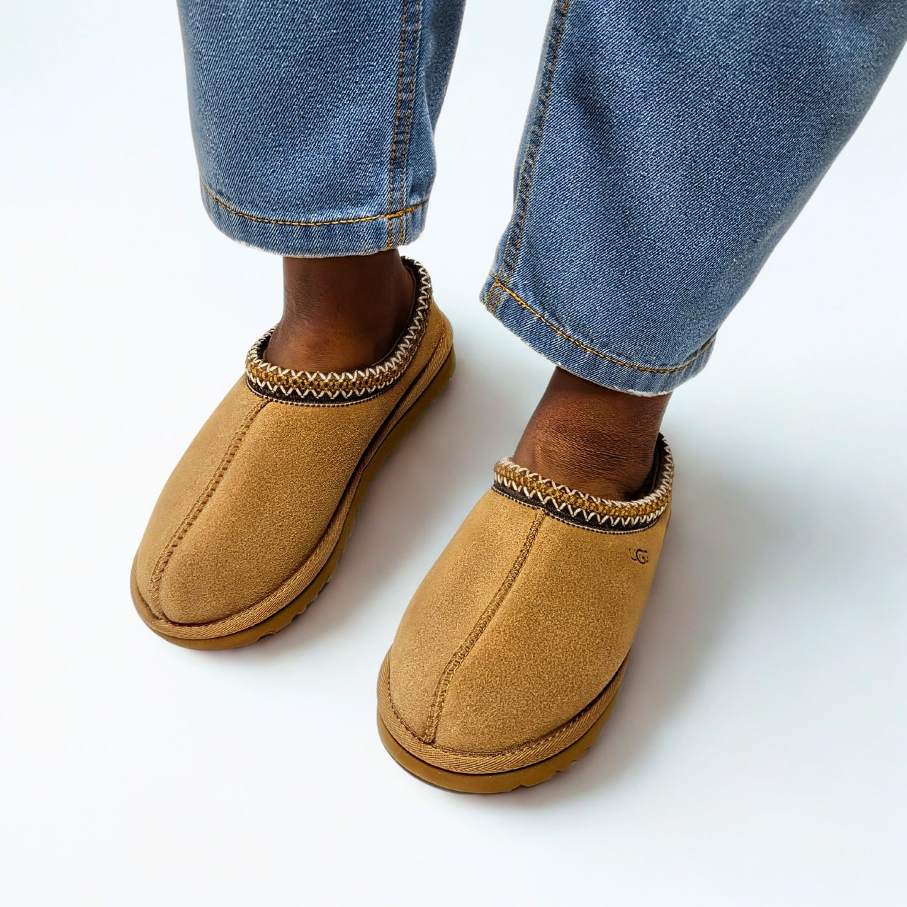 UGG Tasman Chestnut Clog – suede upper, 17mm UGGplush™ insole, eco-friendly UGGbraid trim, lightweight EVA outsole, and embossed UGG® logo 1