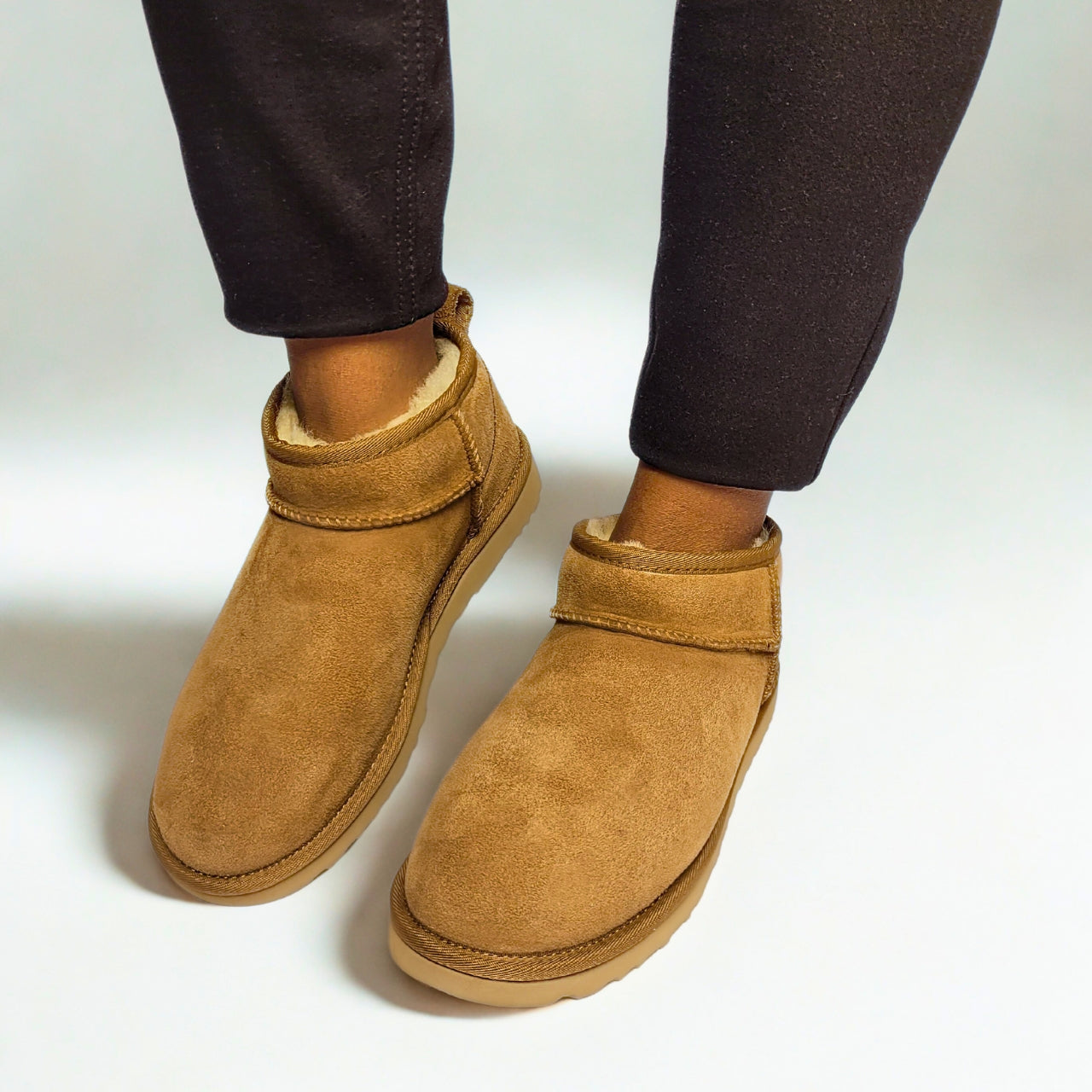 UGG Classic Mini chestnut platform boots with suede upper and UGGplush wool lining. 1