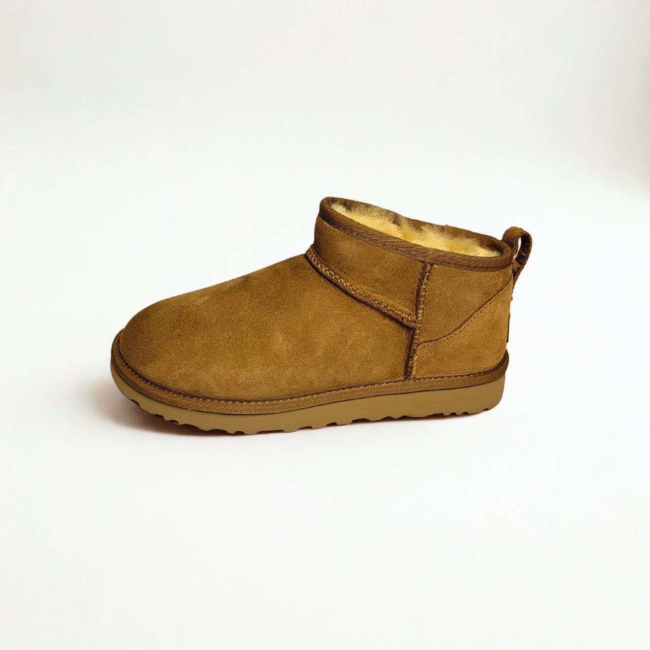  UGG Classic Mini chestnut platform boots with suede upper and UGGplush wool lining. 3