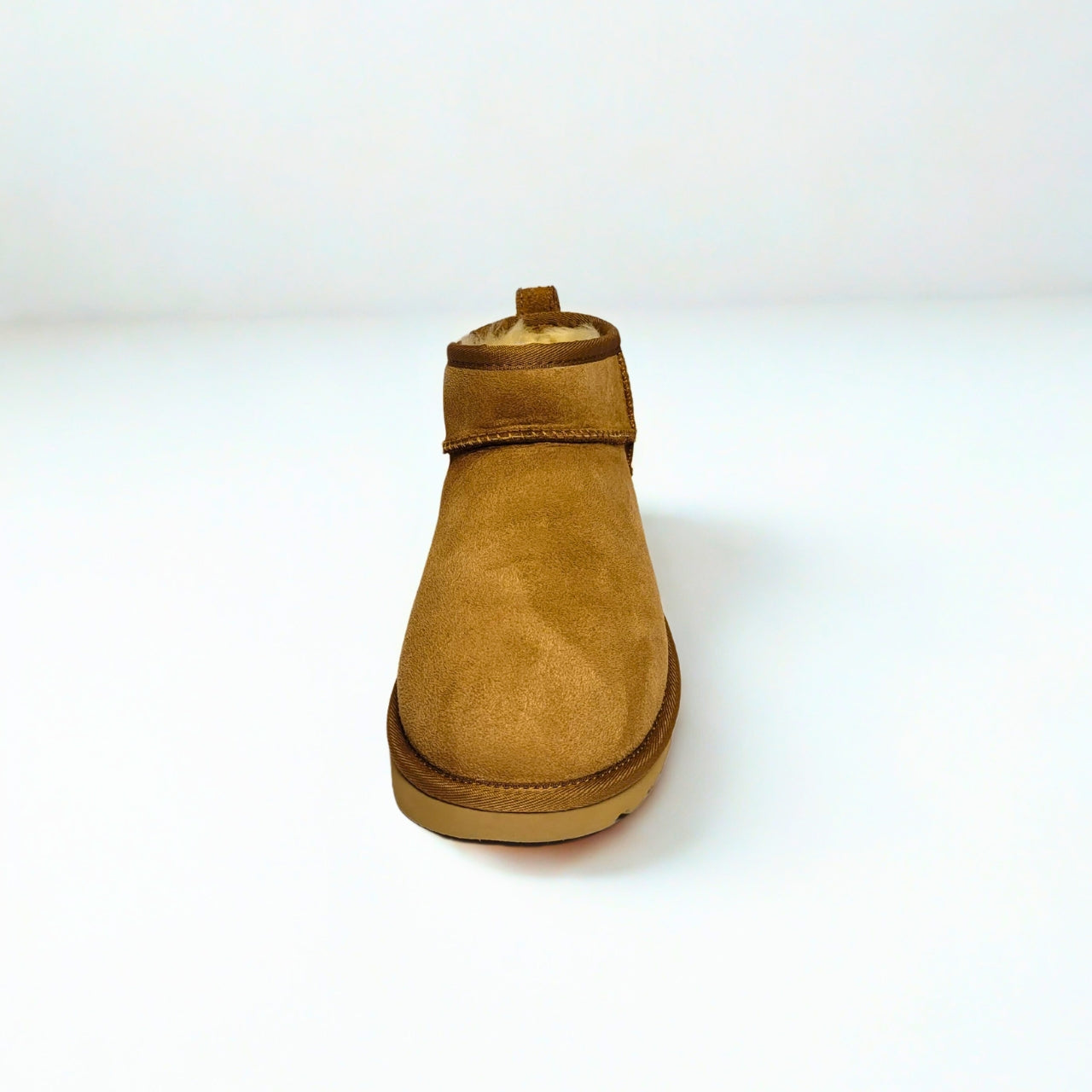  UGG Classic Mini chestnut platform boots with suede upper and UGGplush wool lining. 4