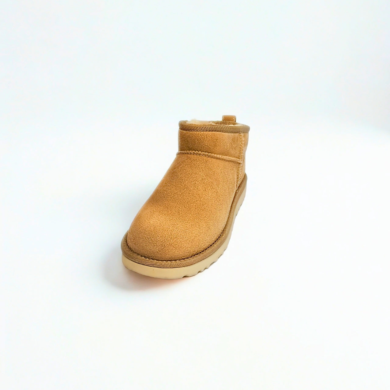  UGG Classic Ultra Mini sand sheepskin boots with 3.5" shaft, water-repellent suede, and sugarcane EVA outsole 2